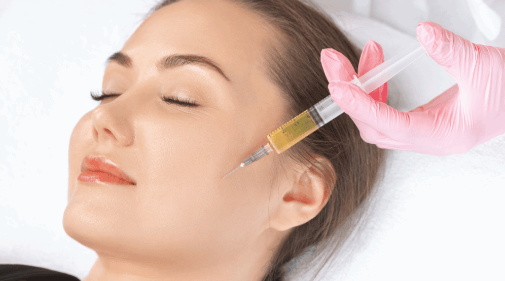 A woman in her late 30s walks into ViViDerma Cosmetic Clinic, curious but nervous about her first vampire facial. After a personalized consultation, her provider draws a small vial of blood, spins it into golden PRP, and applies it during microneedling. Over the next few weeks, she watches her fine lines fade, her acne scars soften, and her complexion glow like it hasn’t in years—all from her body’s own healing power.