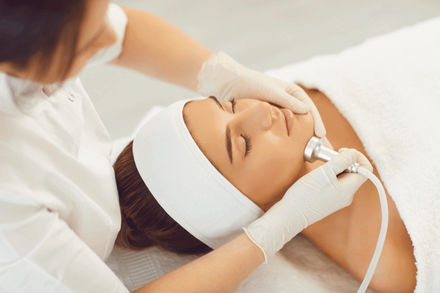 Medical microneedling facial treatment designed to improve skin texture, acne scars, and collagen at a Toronto clinic.